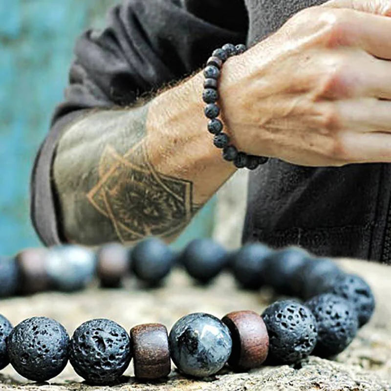 Volcanic Lava Stone Beaded Bracelet with Tibetan Buddha Charm