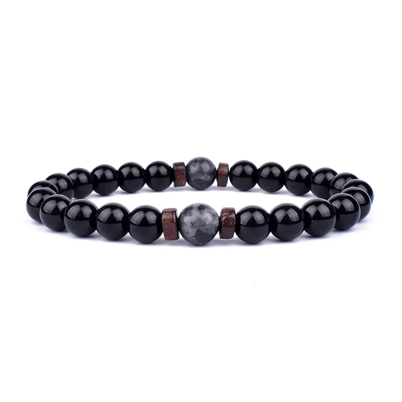 Volcanic Lava Stone Beaded Bracelet with Tibetan Buddha Charm