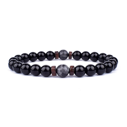 Volcanic Lava Stone Beaded Bracelet with Tibetan Buddha Charm