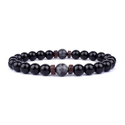 Volcanic Lava Stone Beaded Bracelet with Tibetan Buddha Charm