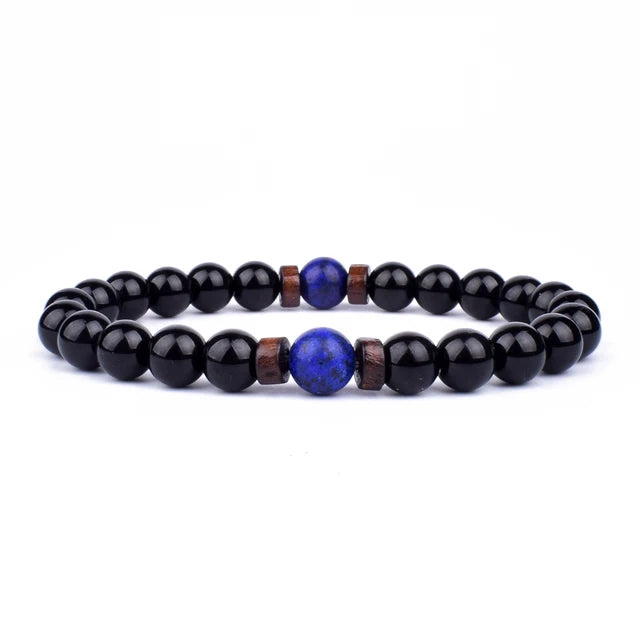 Volcanic Lava Stone Beaded Bracelet with Tibetan Buddha Charm