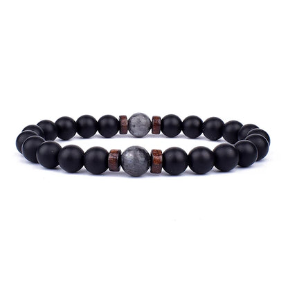 Volcanic Lava Stone Beaded Bracelet with Tibetan Buddha Charm