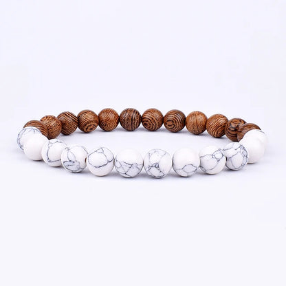 Volcanic Lava Stone Beaded Bracelet with Tibetan Buddha Charm